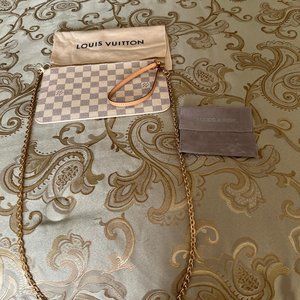 Louis Vuitton authentic Never Full Pouch Clutch Azur